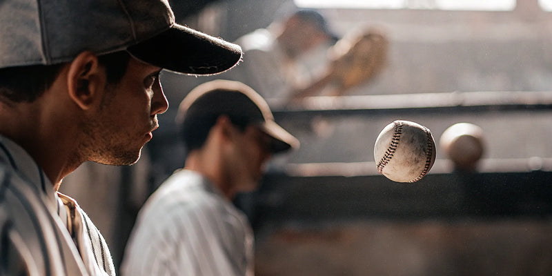 Baseball player using vision training aids to improve ball tracking skills.