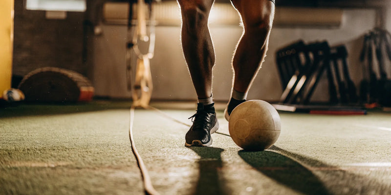 Athlete using the best sports vision training products to track a ball indoors.