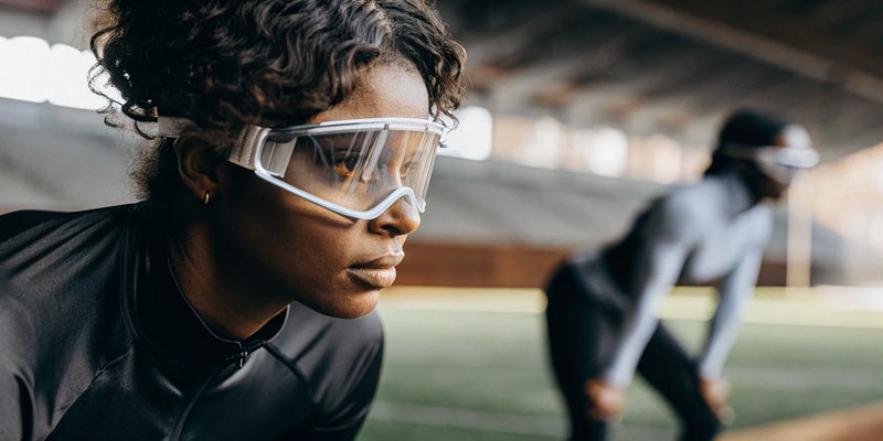 Athlete performing vision training with athletic training goggles.