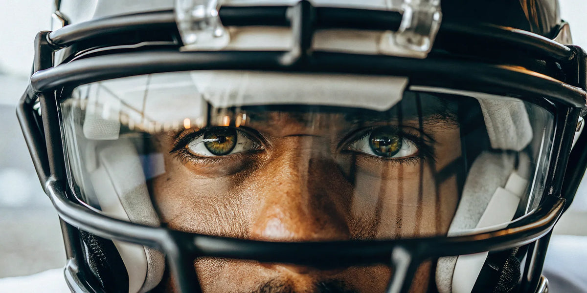 A focused athlete wearing sports vision enhancement goggles for peak performance training.